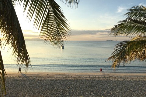 Sunrise at Paradise Resort. Hotels take care to remove rubbish from their patch of sand daily. Photo by: Cindy Fan.